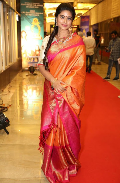 Actress Sneha In Orange Traditional Indian Pattu Saree At Santhosam Awards 3